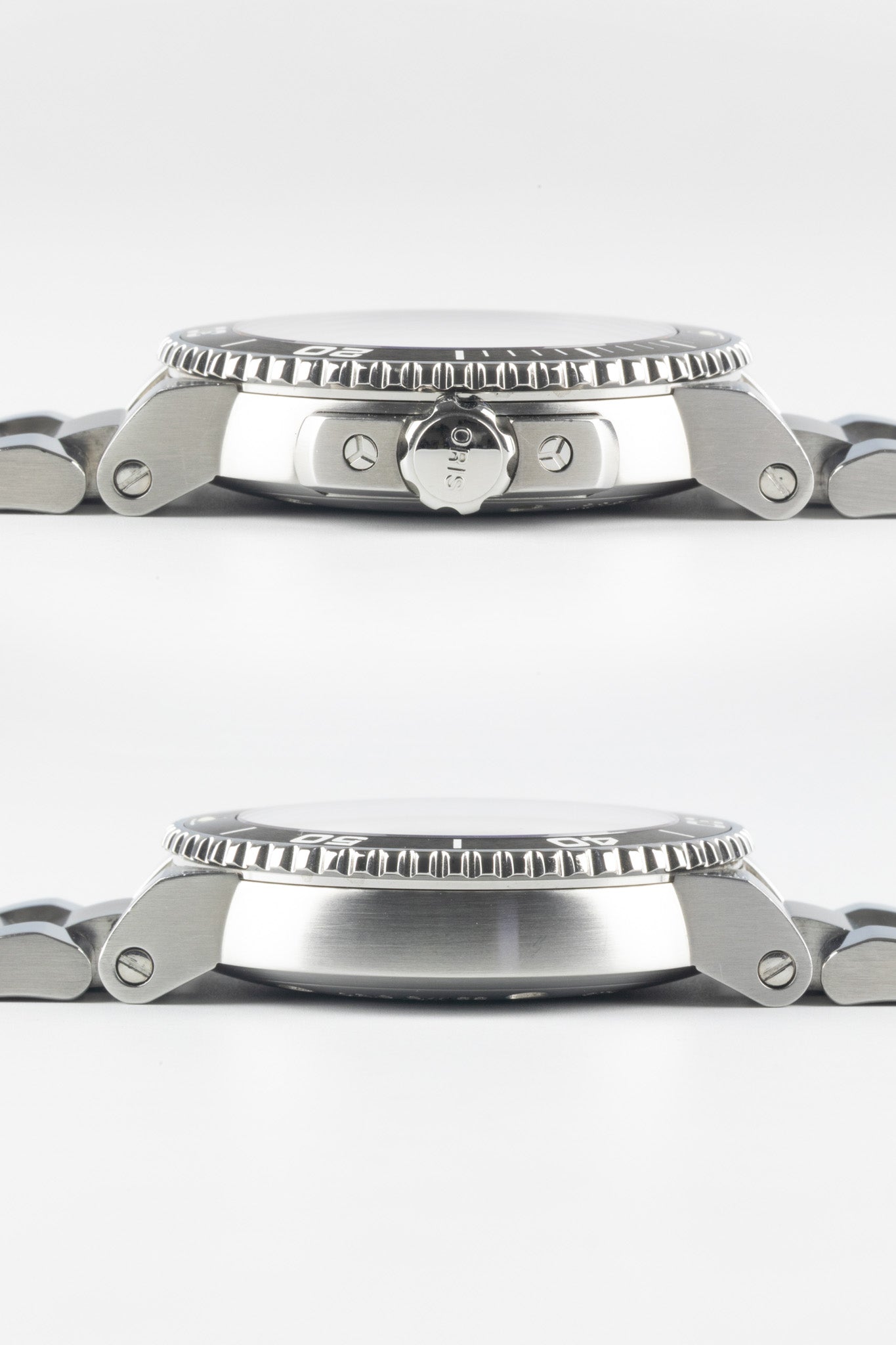 Two horizontal side-profile views of an Oris Aquis Date watch case; the top shows the "ORIS" signed crown and guards, while the bottom shows the smooth, brushed steel side profile.
